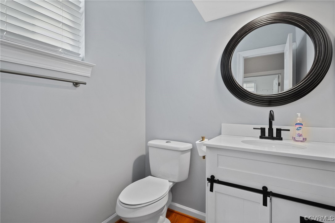 15 Brough Lane Hampton, VA 23669 - Photo 28 of 43 a bathroom with a toilet a sink and a mirror
