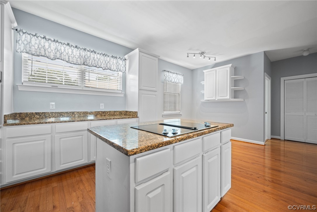 15 Brough Lane Hampton, VA 23669 - Photo 32 of 43 a kitchen with stainless steel appliances granite countertop a sink stove and cabinets