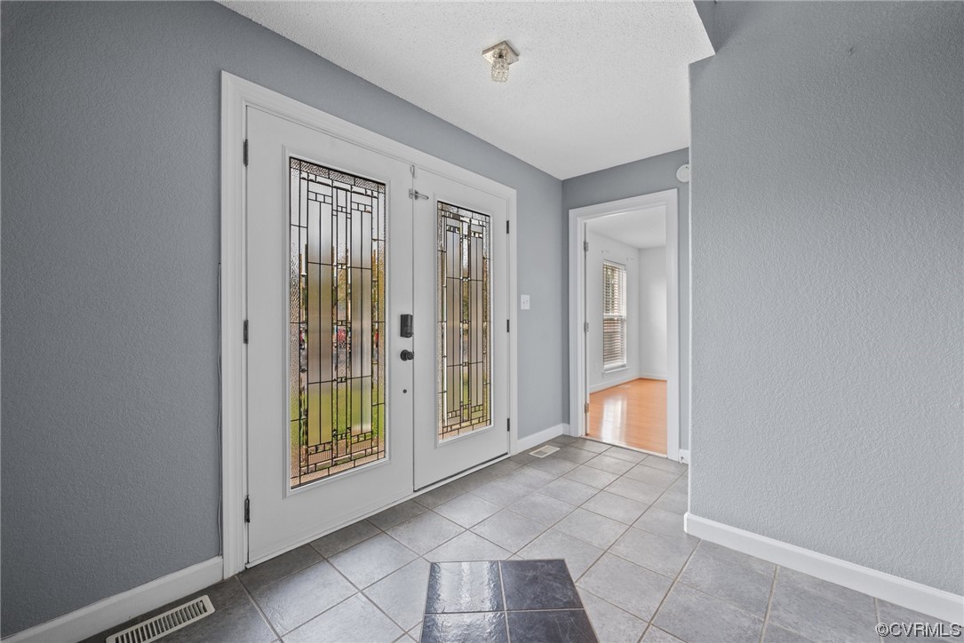 15 Brough Lane Hampton, VA 23669 - Photo 41 of 43 a view of an empty room and glass door