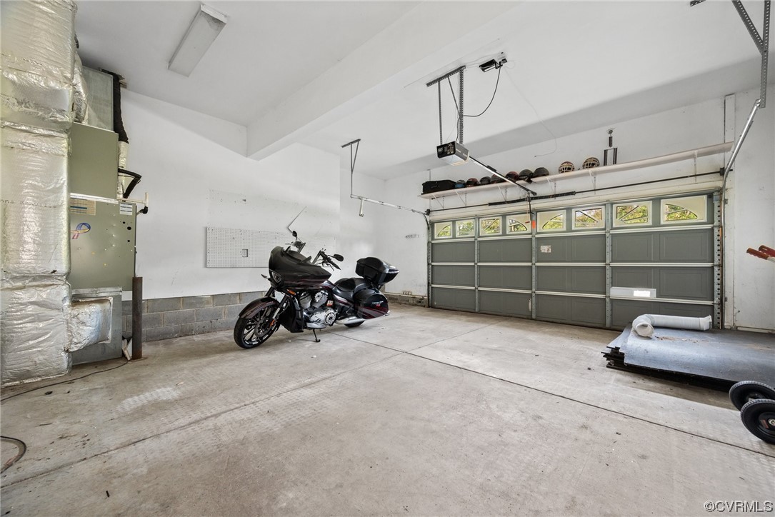 15 Brough Lane Hampton, VA 23669 - Photo 43 of 43 a view of a garage with parked cars