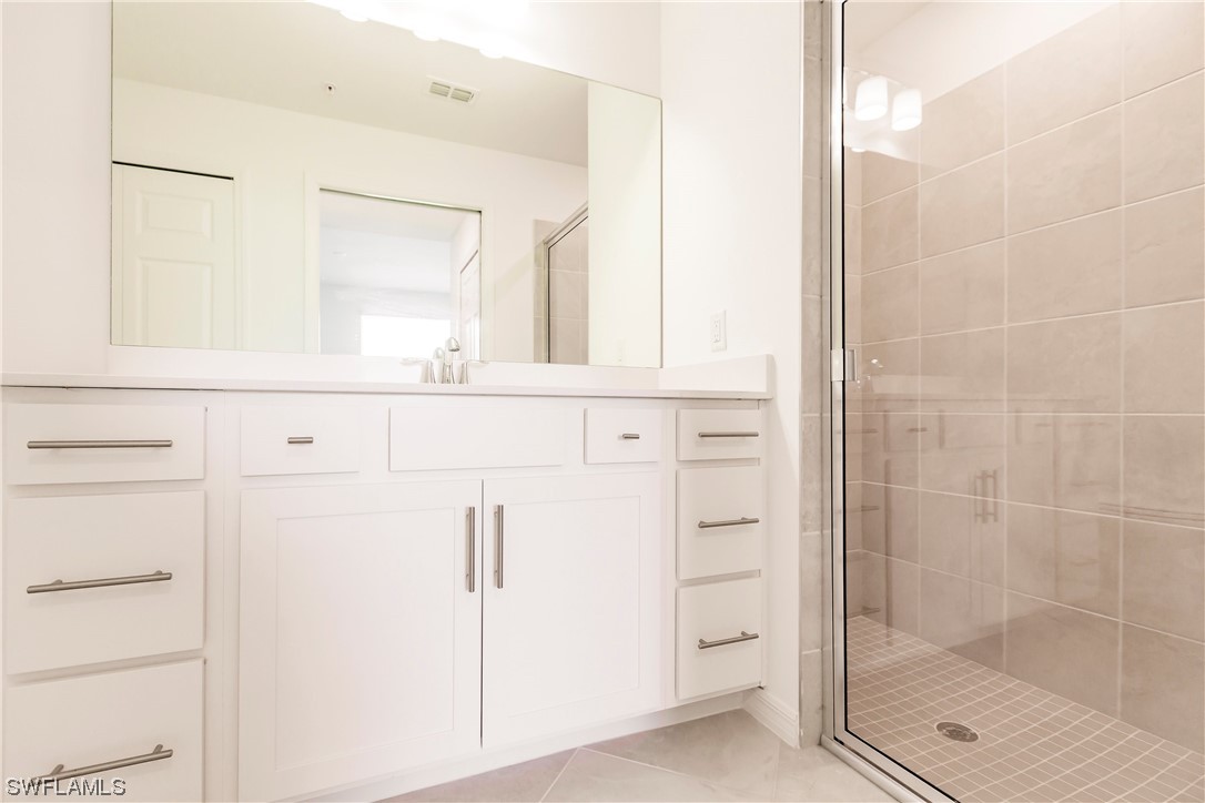 43997 Boardwalk Loop, Unit 1818 Punta Gorda, FL 33982 - Photo 15 of 40 a bathroom with a shower