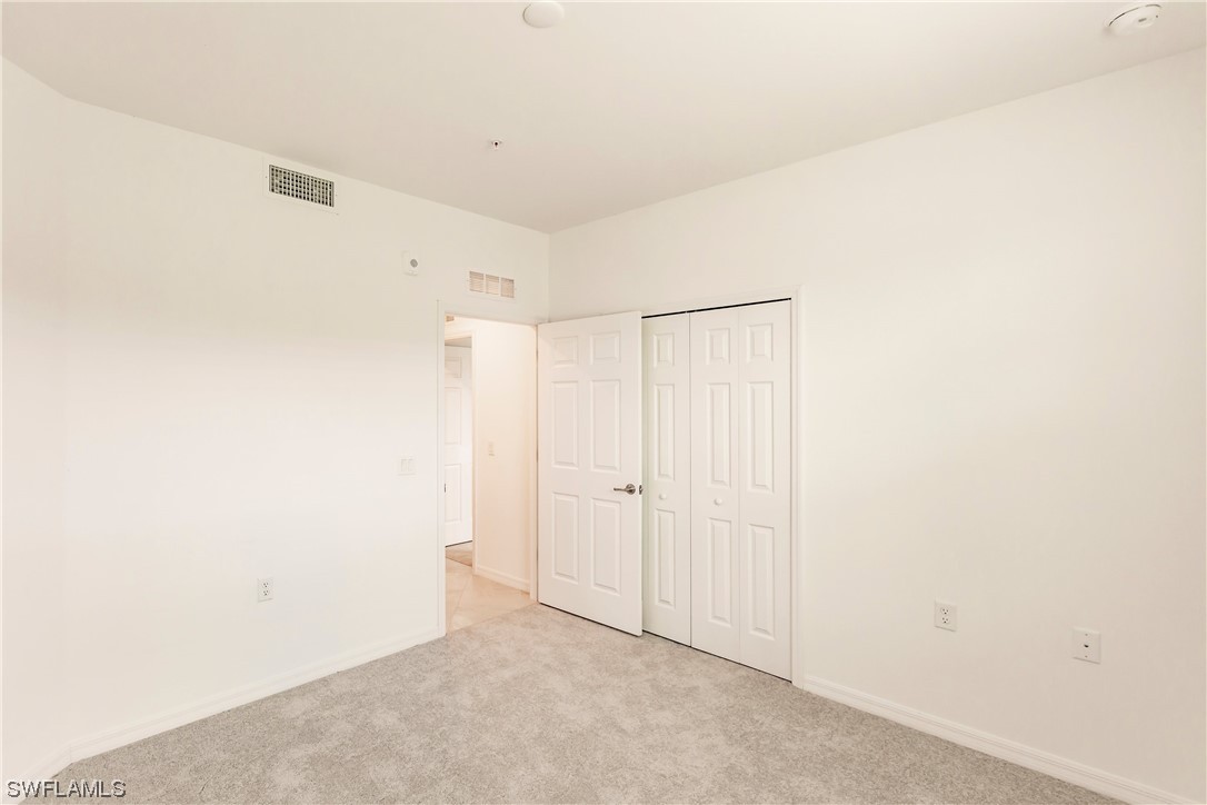 43997 Boardwalk Loop, Unit 1818 Punta Gorda, FL 33982 - Photo 17 of 40 a view of an empty room