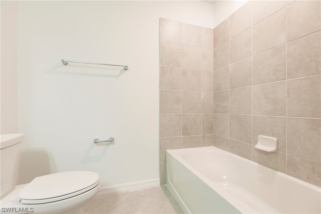 43997 Boardwalk Loop, Unit 1818 Punta Gorda, FL 33982 - Photo 22 of 40 a bathroom with a sink a toilet and bathtub