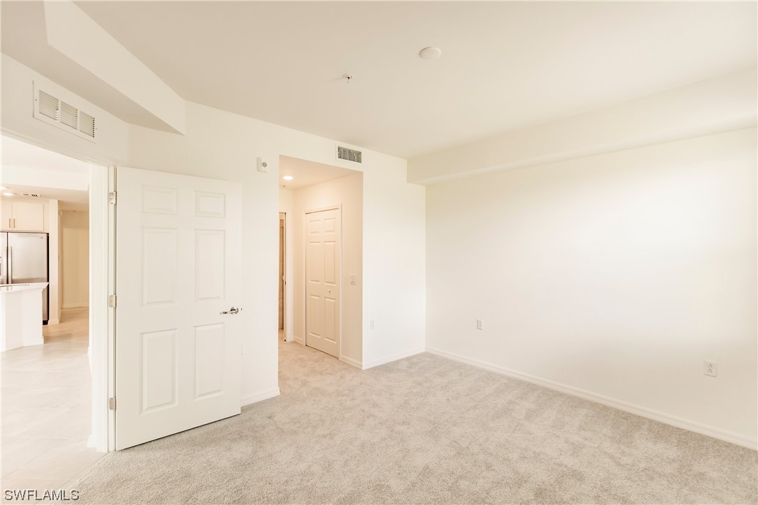 43997 Boardwalk Loop, Unit 1818 Punta Gorda, FL 33982 - Photo 24 of 40 an empty room with a bathroom