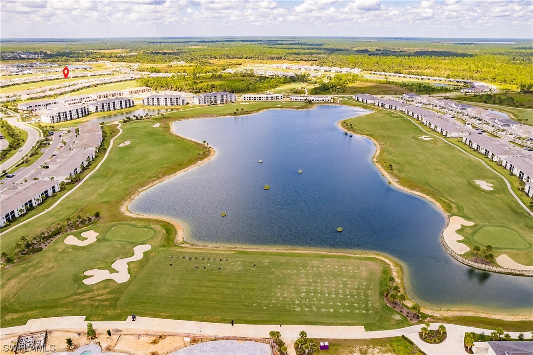 43997 Boardwalk Loop, Unit 1818 Punta Gorda, FL 33982 - Photo 32 of 40 a view of an outdoor space and swimming pool