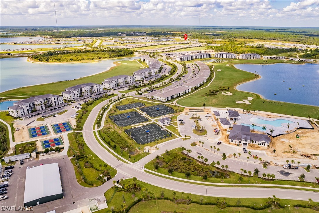 43997 Boardwalk Loop, Unit 1818 Punta Gorda, FL 33982 - Photo 33 of 40 an aerial view of a swimming pool and outdoor space