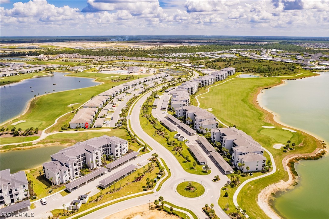 43997 Boardwalk Loop, Unit 1818 Punta Gorda, FL 33982 - Photo 37 of 40 a view of swimming pool with an ocean view