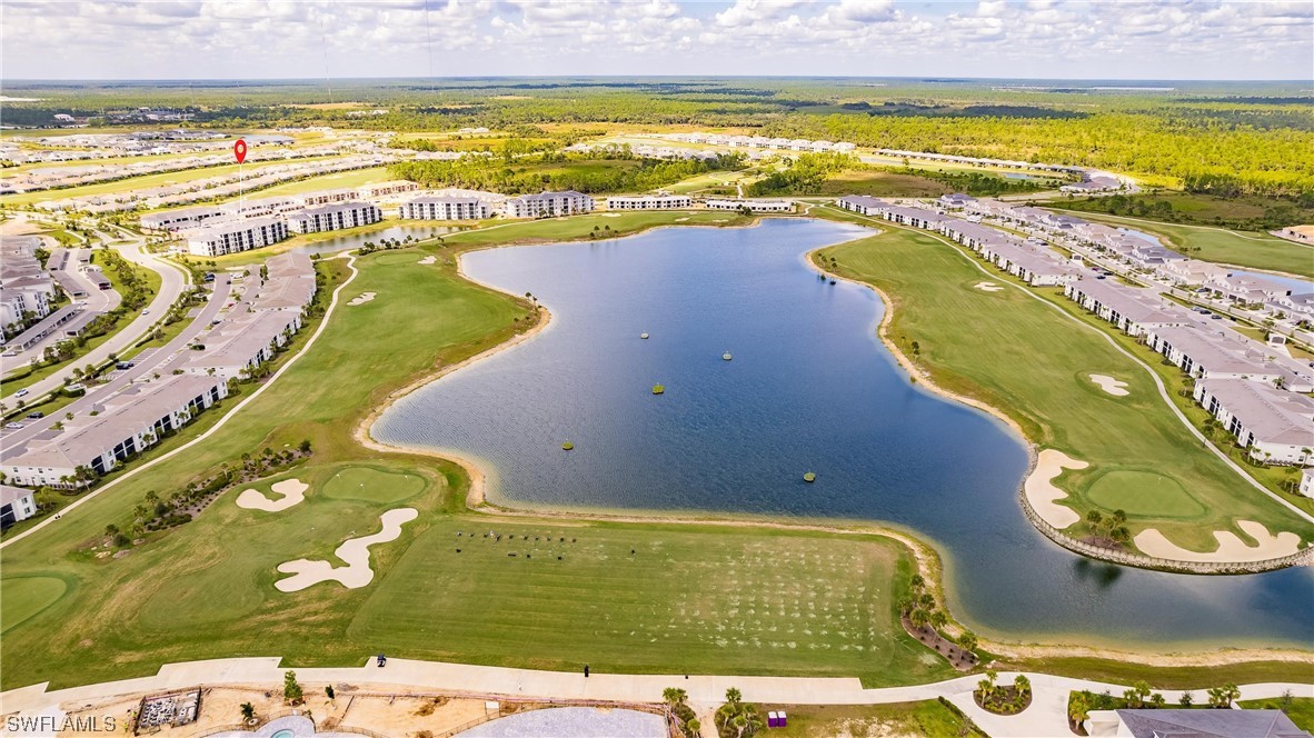 43997 Boardwalk Loop, Unit 1818 Punta Gorda, FL 33982 - Photo 40 of 40 a view of an outdoor space and swimming pool