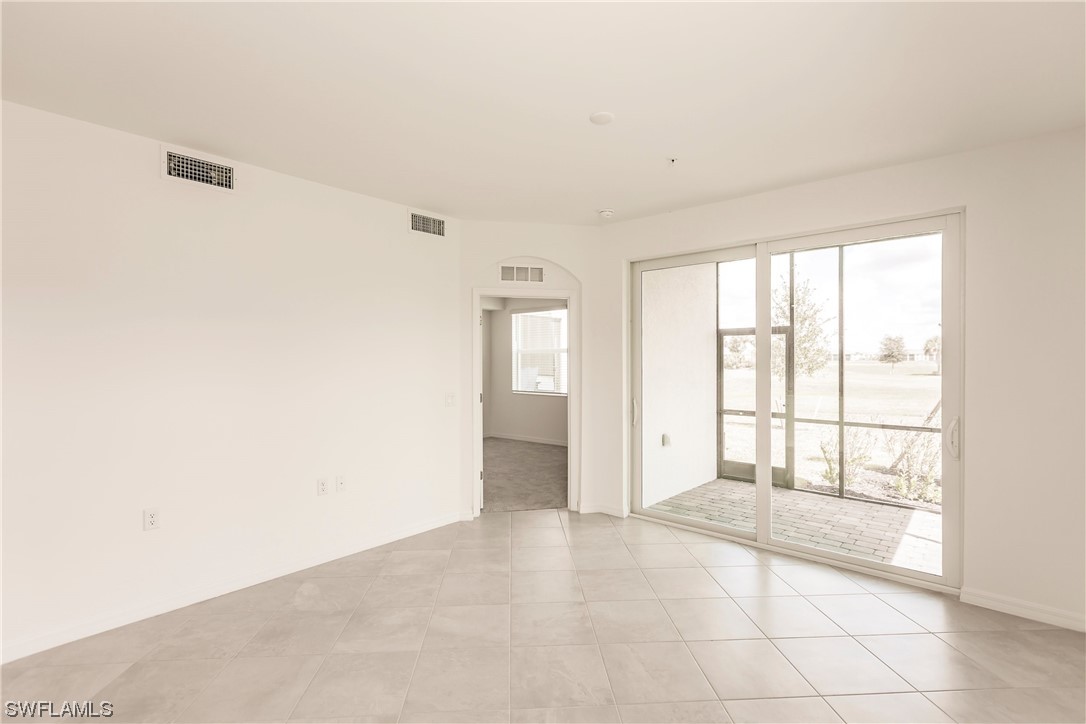43997 Boardwalk Loop, Unit 1818 Punta Gorda, FL 33982 - Photo 7 of 40 a view of an empty room with a window