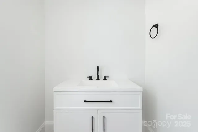 a close view of laundry room with a washer and dryer