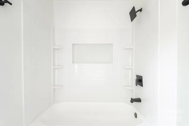 a bathroom with a bathtub