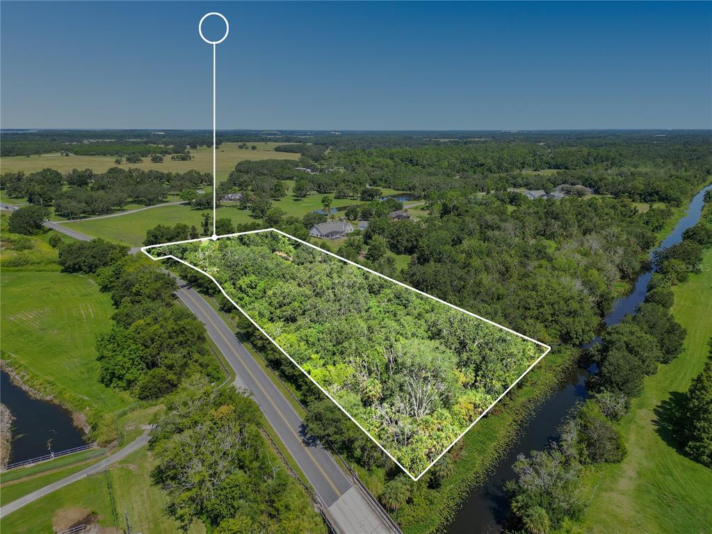 26000 Splendid Meadow Court Astatula, FL 34705 - Photo 10 of 12 a view of a city from a balcony