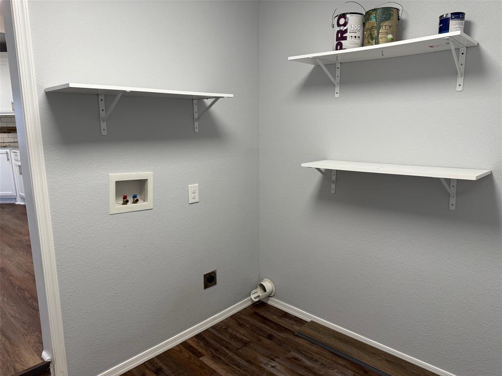 1826 North Woods Street Sherman, TX 75092 - Photo 22 of 29 a view of small space with racks on the wall
