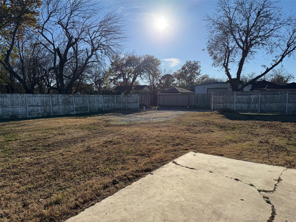 1826 North Woods Street Sherman, TX 75092 - Photo 25 of 29 a view of a backyard