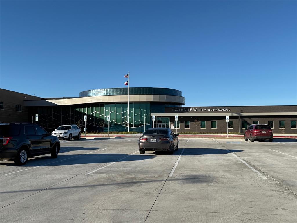 1826 North Woods Street Sherman, TX 75092 - Photo 27 of 29 a view of car parked in front of building