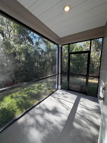 a view of backyard with green space