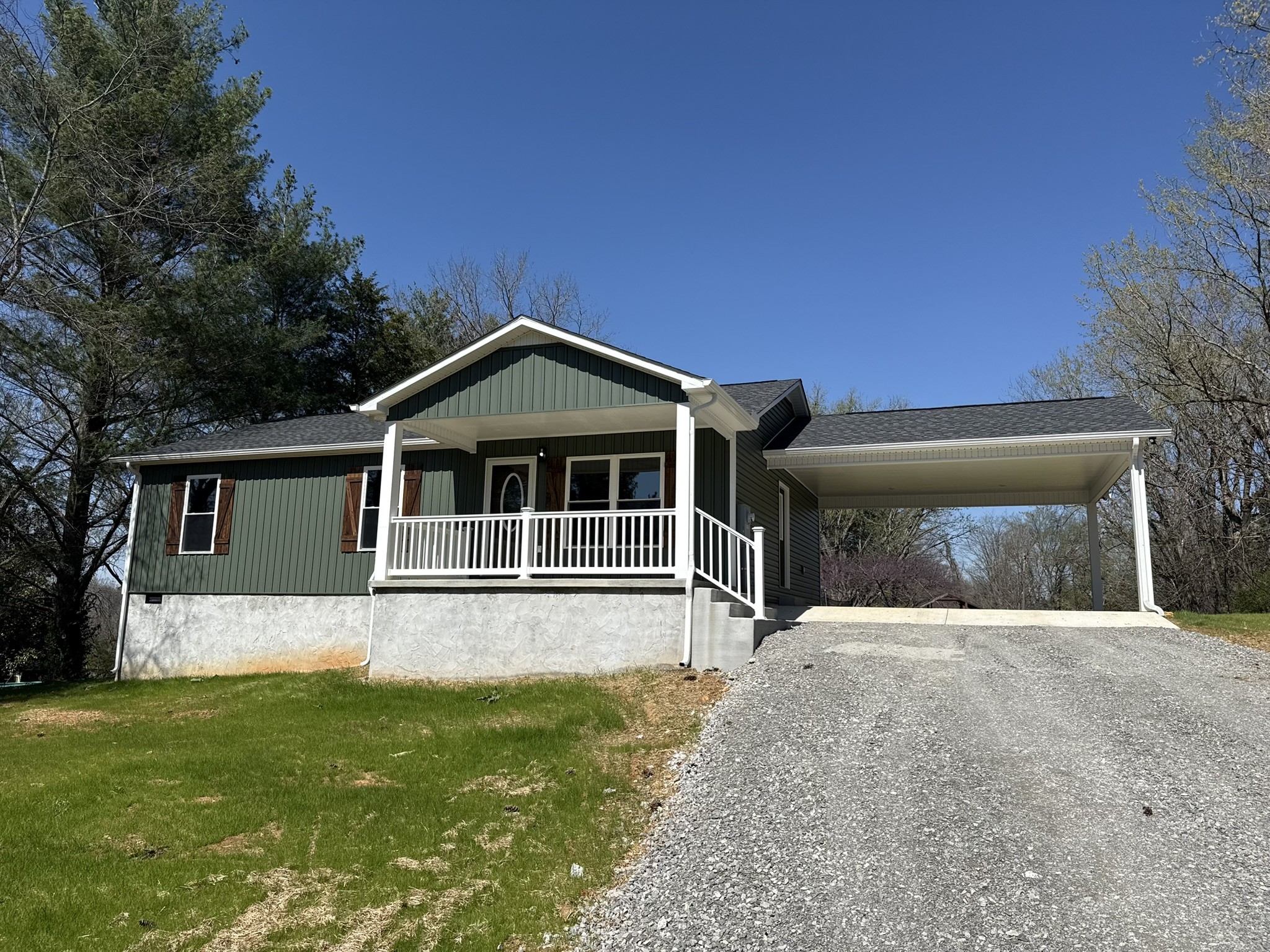 44 Blue Lake Road McMinnville, TN 37110 - Photo 6 of 30 a front view of a house with a yard