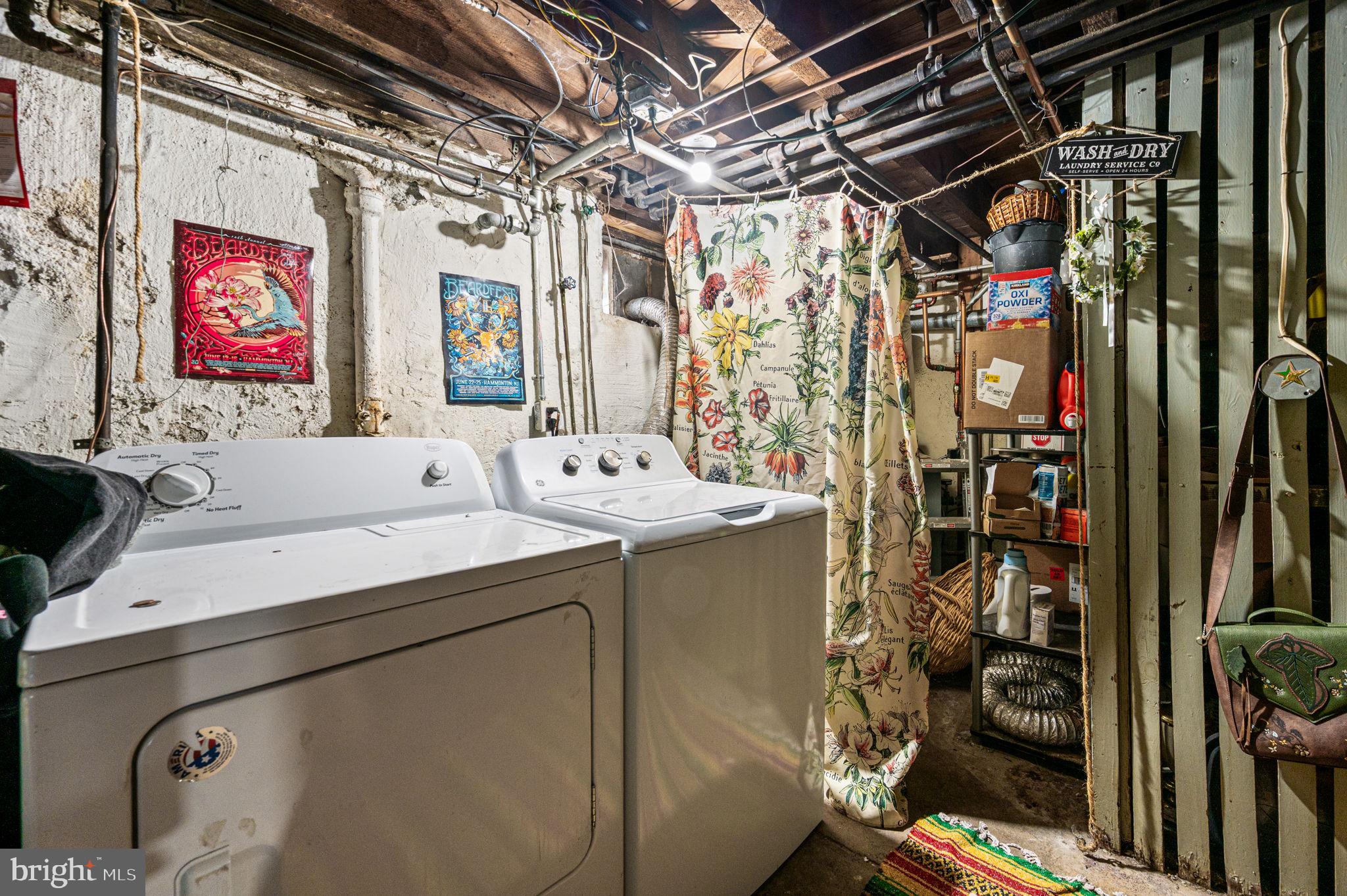 828 Derwyn Road Drexel Hill, PA 19026 - Photo 21 of 25 a utility room with dryer and washer