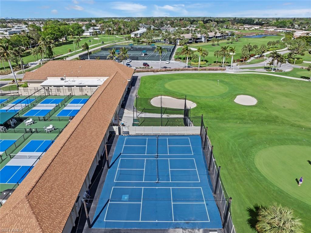 126 Harrison Road, Unit M3 Naples, FL 34112 - Photo 33 of 48 Drone / aerial view featuring golf course view