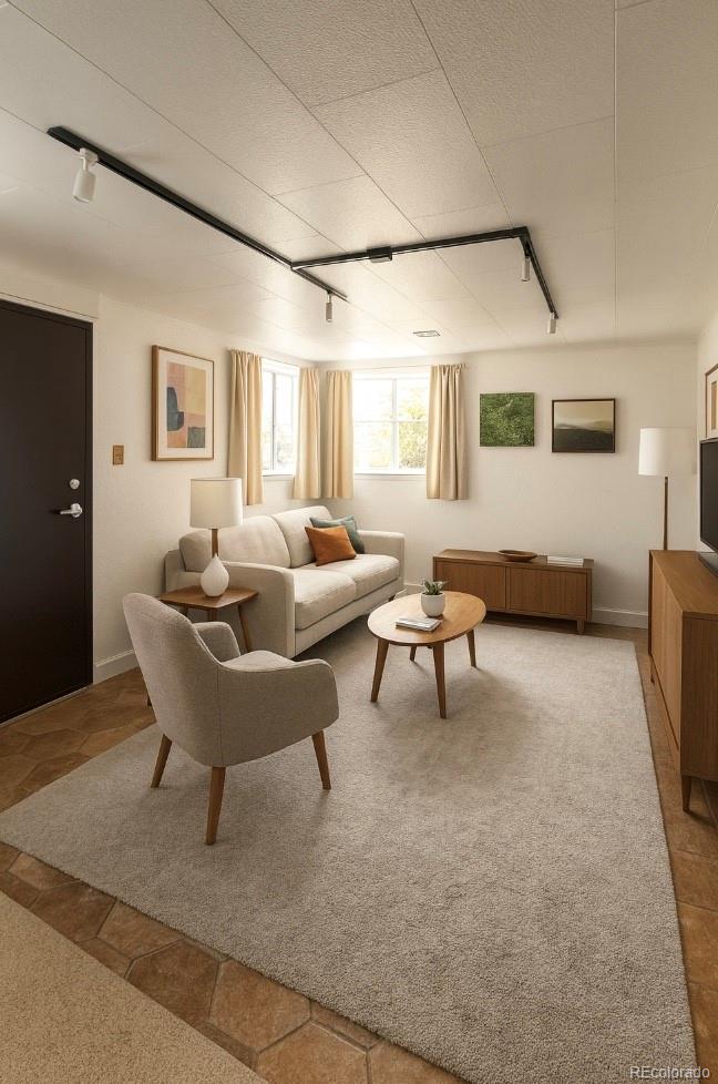 2355 Ames Street Edgewater, CO 80214 - Photo 11 of 29 a living room with furniture and a window