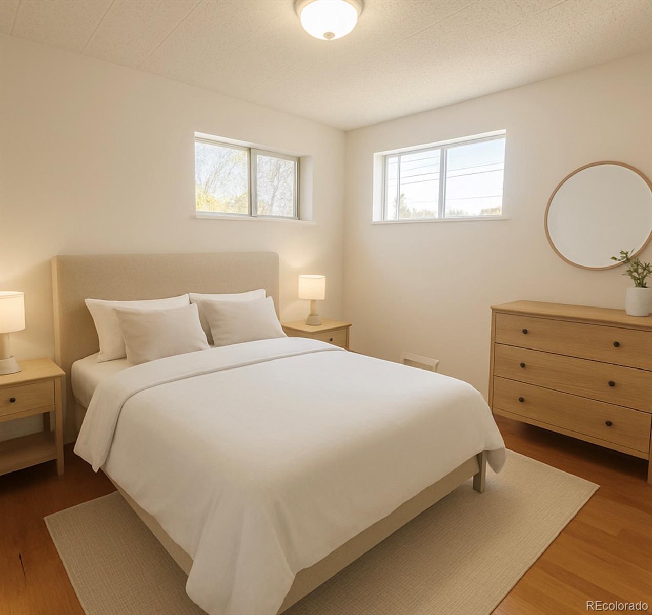 2355 Ames Street Edgewater, CO 80214 - Photo 8 of 29 a bedroom with a bed and a closet