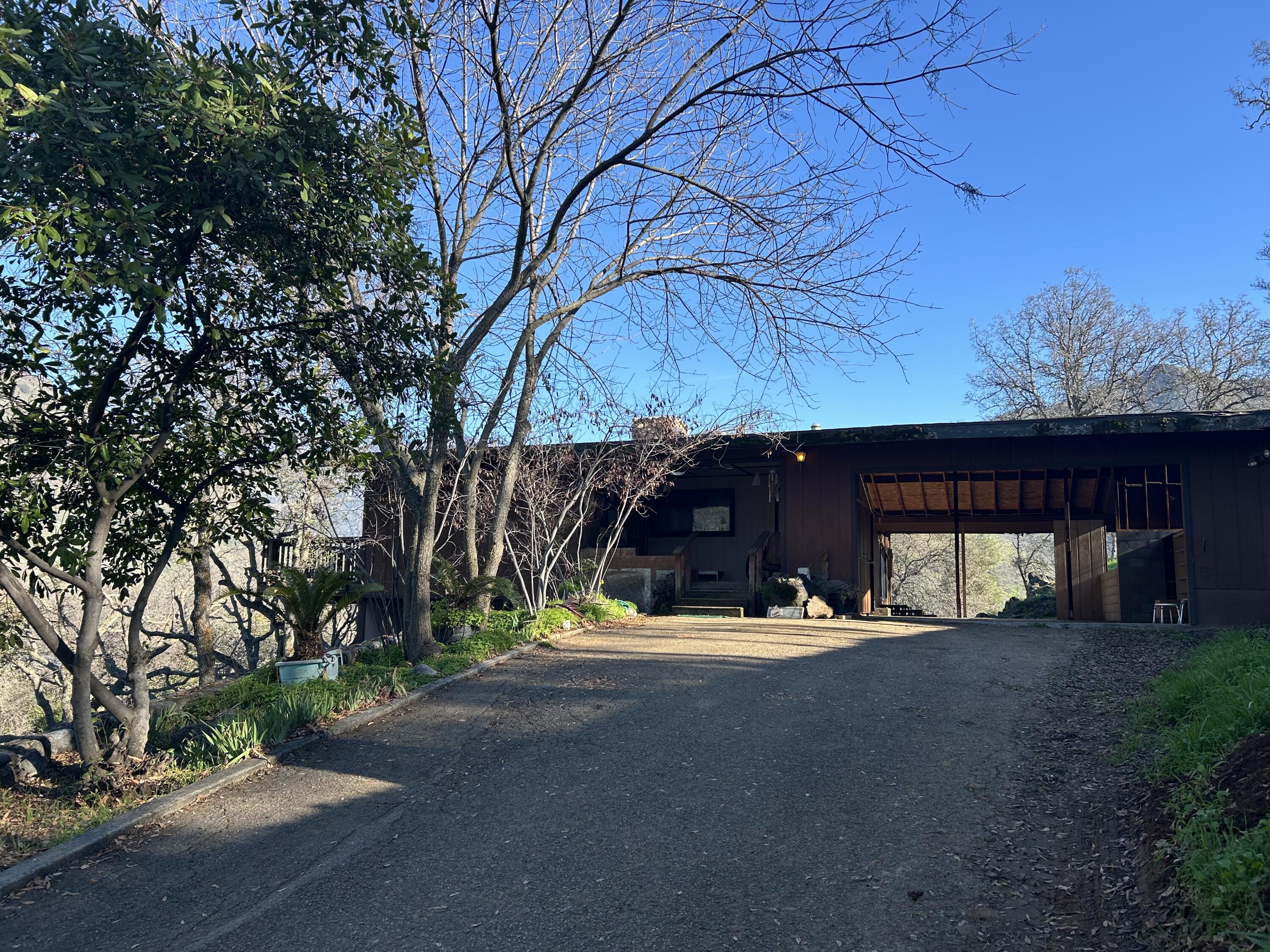 40838 Oak Ridge Drive Three Rivers, CA 93271 - Photo 8 of 51 a view of a house with a yard and tree