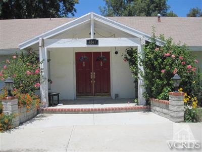 4347 Apricot Road Simi Valley, CA 93063 - Photo 2 of 19 a front view of a house with a garage