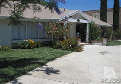 4347 Apricot Road Simi Valley, CA 93063 - Photo 4 of 19 a view of a house with a yard