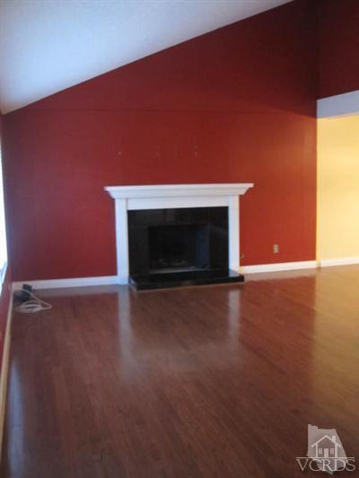 4347 Apricot Road Simi Valley, CA 93063 - Photo 8 of 19 a view of an empty room with a fireplace