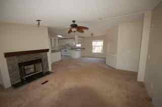 1580 Turner Branch Road Goodview, VA 24095 - Photo 6 of 19 a living room with furniture and a fireplace