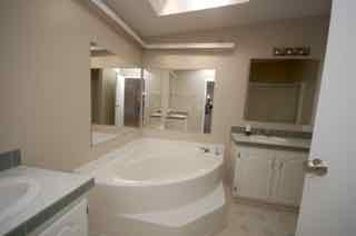 1580 Turner Branch Road Goodview, VA 24095 - Photo 10 of 19 a bathroom with a bathtub and a sink