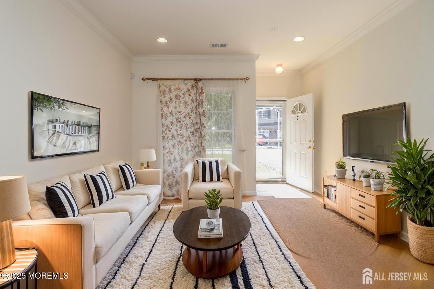 Undisclosed Address Monroe Township, NJ 08831 - Photo 3 of 10 a living room with furniture and a flat screen tv