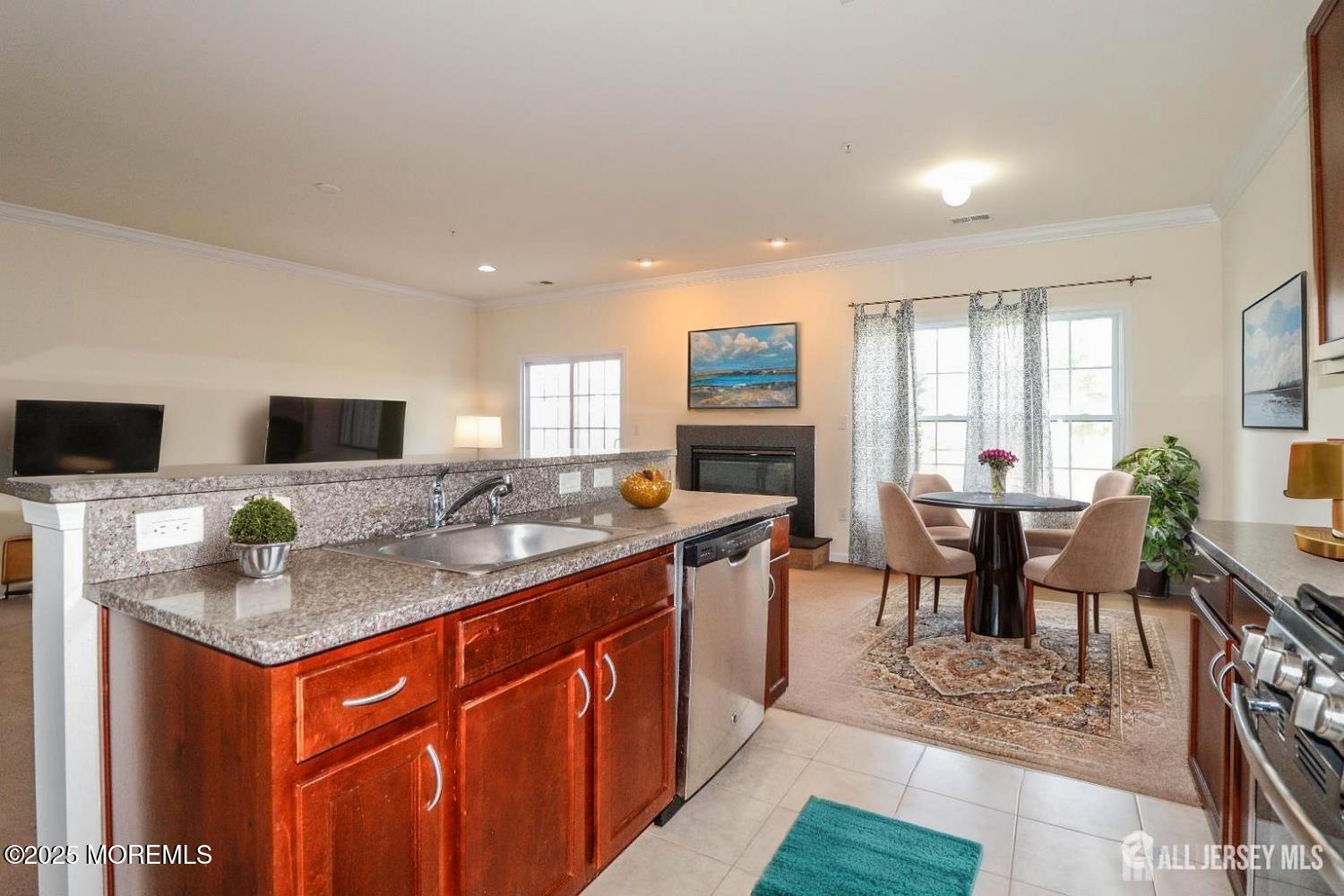Undisclosed Address Monroe Township, NJ 08831 - Photo 6 of 10 a kitchen with stainless steel appliances granite countertop counter space a sink and a refrigerator