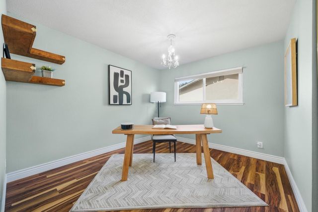 a workspace with wooden floor