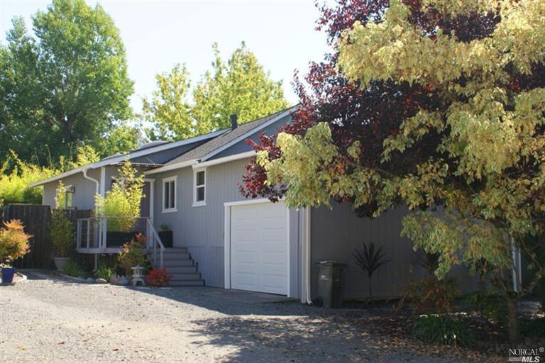 3167 Ross Road Graton, CA 95444 - Photo 1 of 1 a house with a tree in front of it