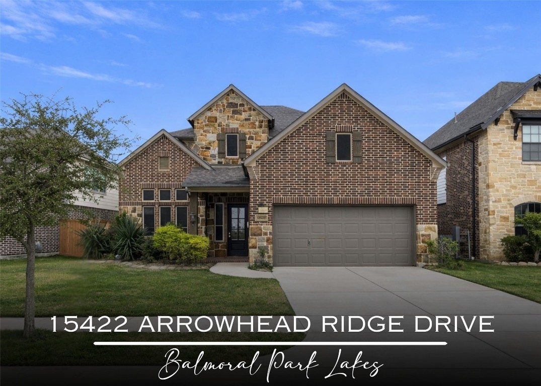 15422 Arrowhead Ridge Drive Humble, TX 77396 - Photo 1 of 40 a front view of a house with a garden