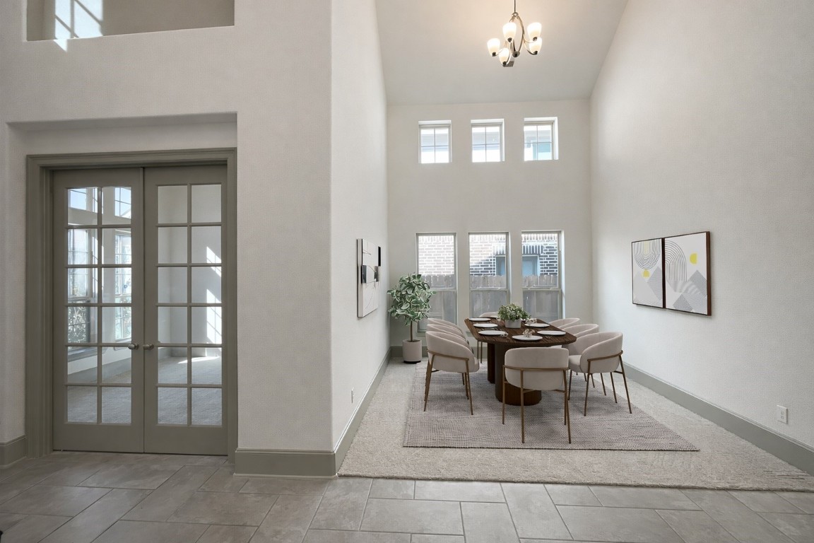 15422 Arrowhead Ridge Drive Humble, TX 77396 - Photo 3 of 40 a dining room with furniture and chandelier fan