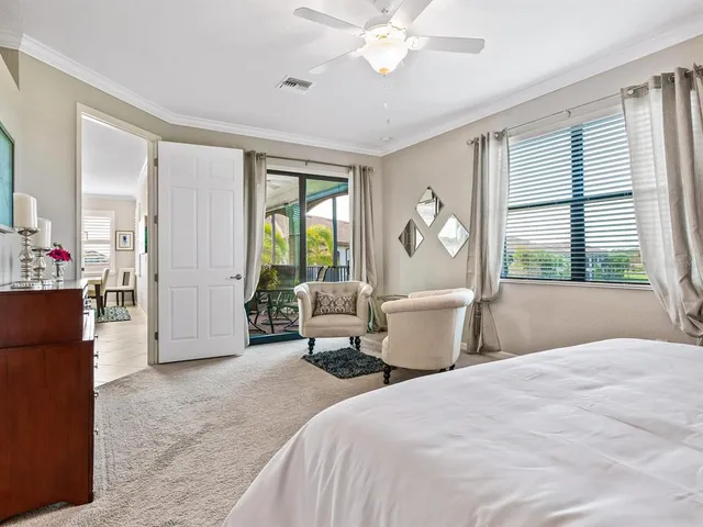 a view of swimming pool with a garden and trees
