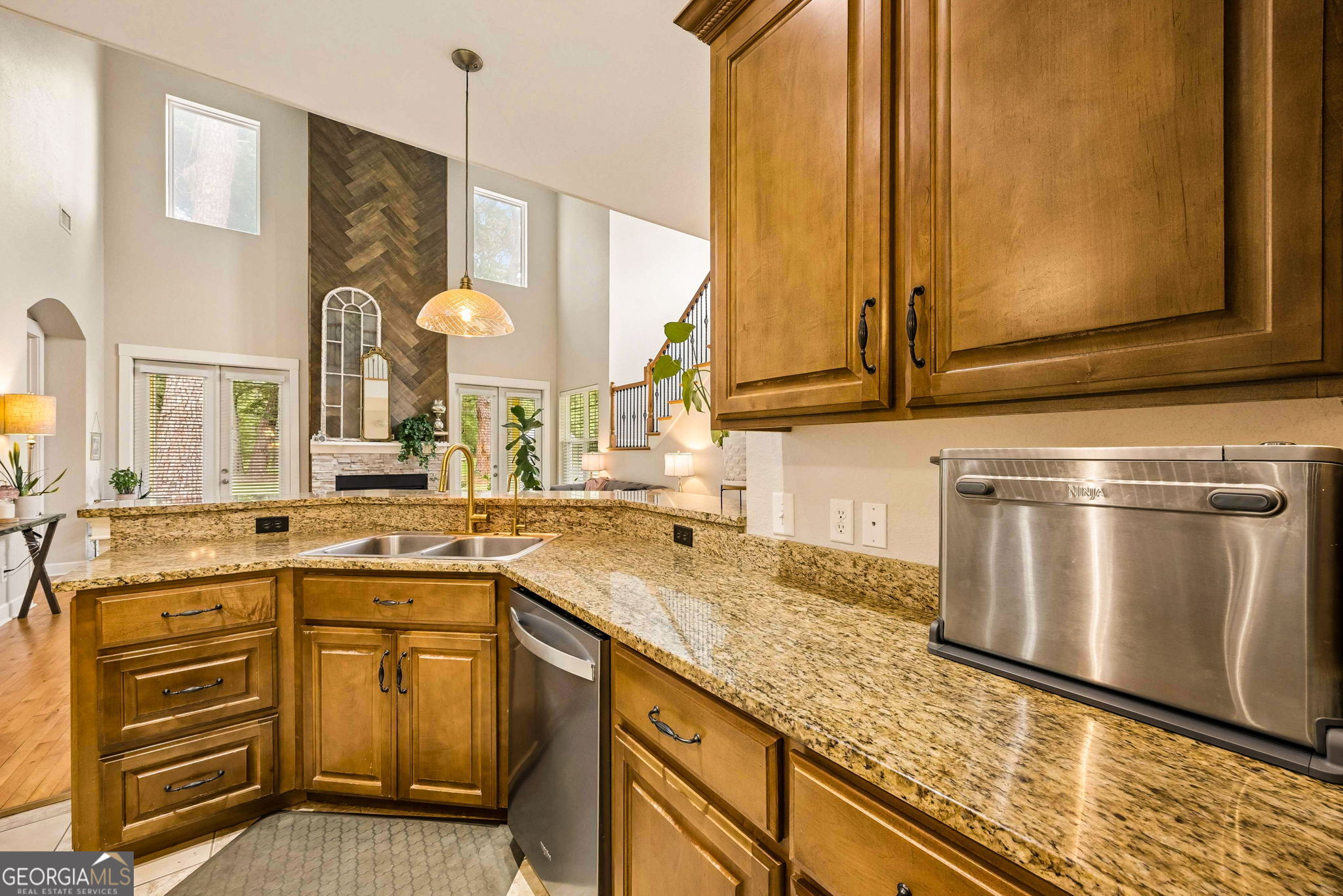 706 Hopewell Point Road White Oak, GA 31568 - Photo 21 of 84 The open-concept layout allows the kitchen to overlook the dramatic great room, creating an ideal setting for everyday living and entertaining.