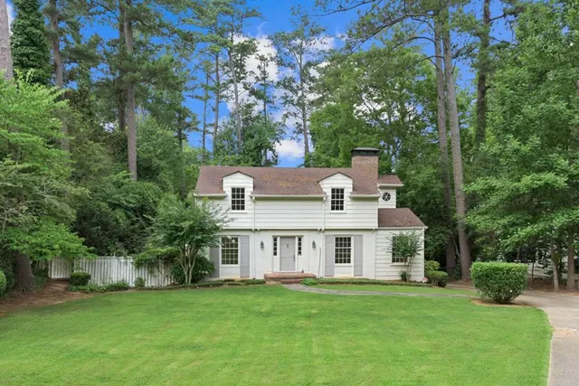 a view of a house with a big yard