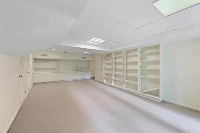 an empty room with a empty shelves