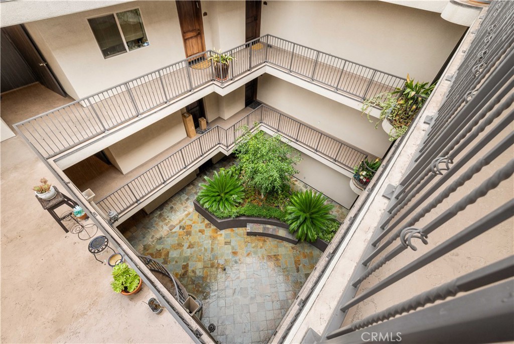 11218 Camarillo Street, Unit 404 Toluca Lake, CA 91602 - Photo 11 of 53 a view of a balcony with furniture