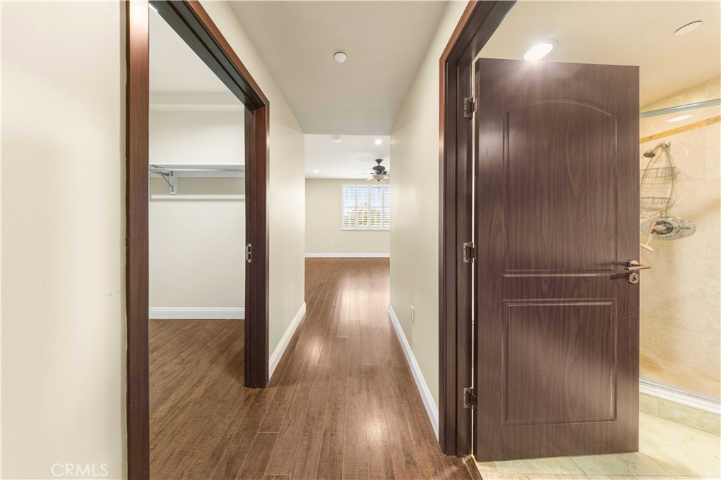11218 Camarillo Street, Unit 404 Toluca Lake, CA 91602 - Photo 42 of 53 a view of hallway with wooden floor