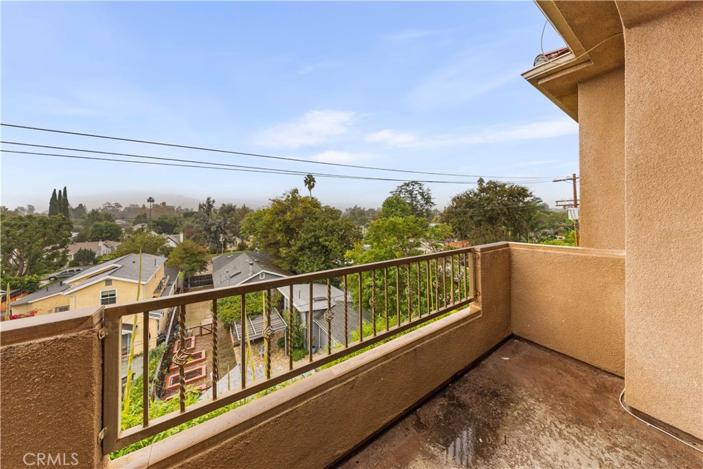 11218 Camarillo Street, Unit 404 Toluca Lake, CA 91602 - Photo 47 of 53 a view of a balcony with city view
