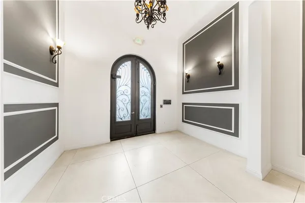 a bathroom with mirror gate