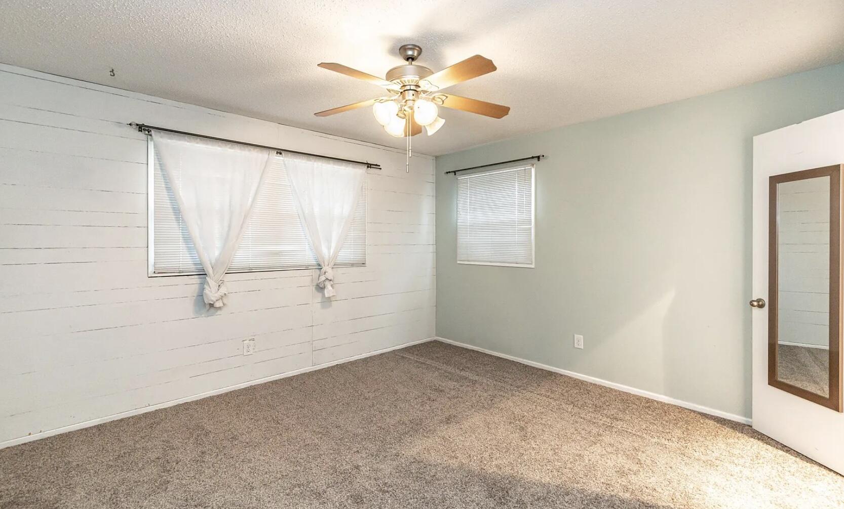 5424 14th Street Lubbock, TX 79416 - Photo 11 of 20 a view of an empty room with a window