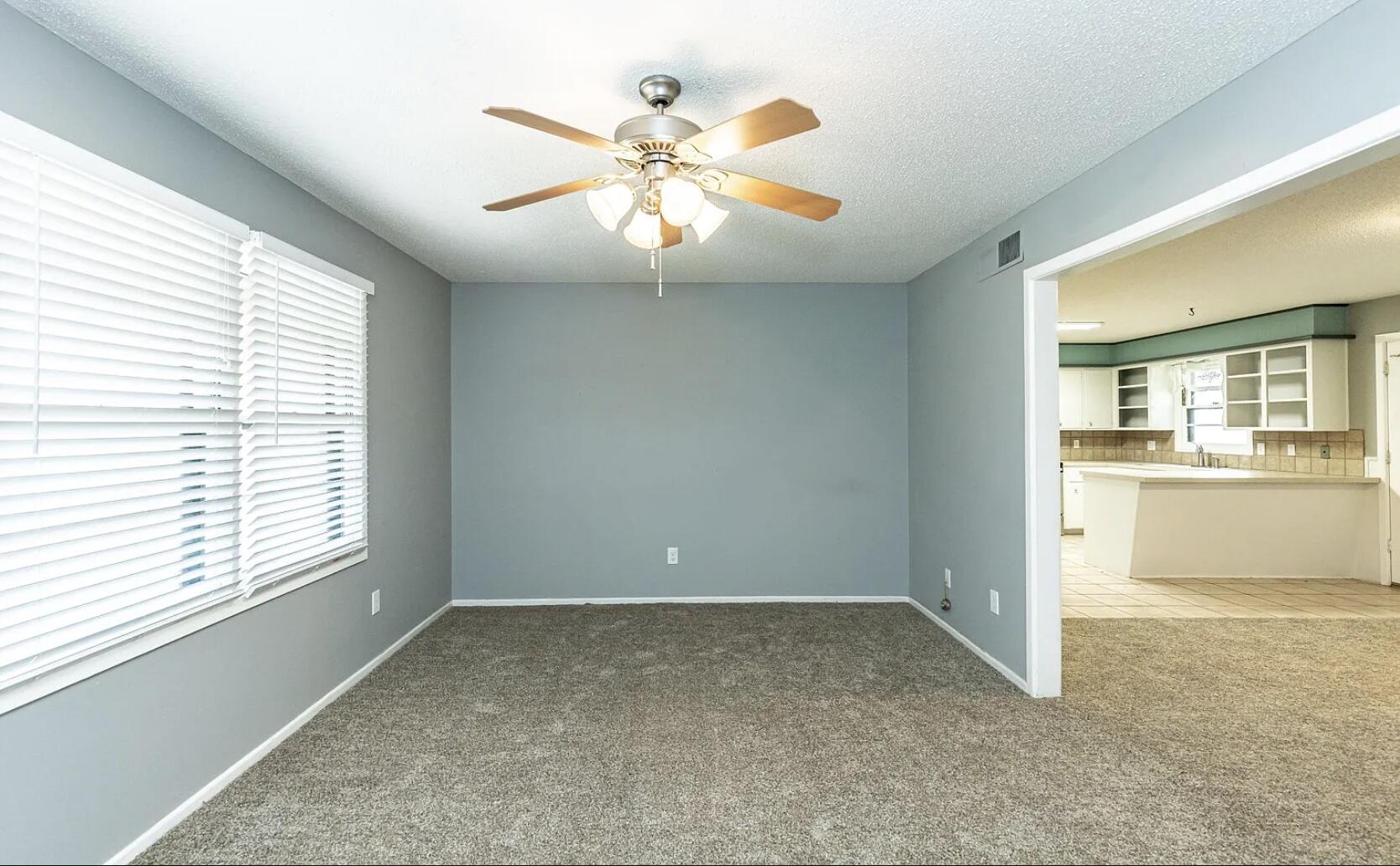 5424 14th Street Lubbock, TX 79416 - Photo 5 of 20 a view of a kitchen with a sink and cabinet area