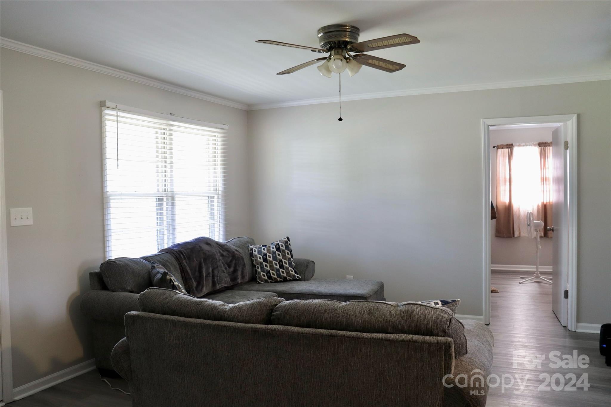 209 Old Williams Road Wingate, NC 28174 - Photo 7 of 13 a living room with furniture and a window