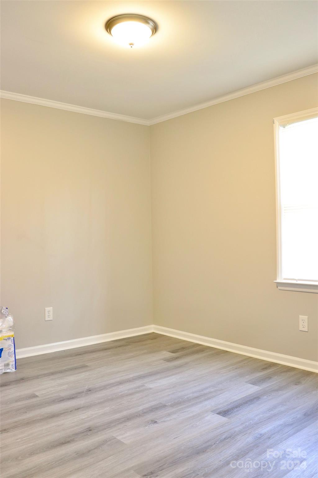209 Old Williams Road Wingate, NC 28174 - Photo 10 of 13 a view of a room with wooden floor and a window