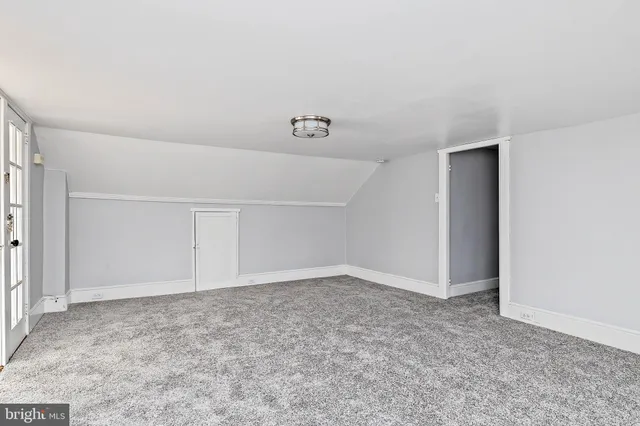 an empty room with an entryway